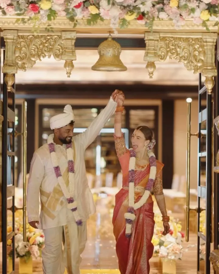 The newlyweds walking out together